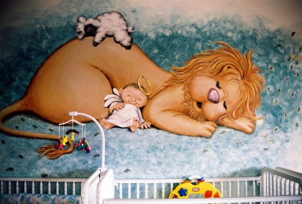 Mural of a lion painted in a nursery room